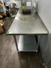 DESCRIPTION 8' X 30" STAINLESS TABLE W/ 2" BACK SPLASH ADDITIONAL INFORMATION CONTENTS ARE NOT INCLUDED. SIZE 8' X 30" LOCATION KITCHEN QTY 1 - 3