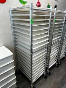 DESCRIPTION WINHOLT TWENTY PAN TRAY RACK W/ PLASTIC DOUGH SHEET. BRAND / MODEL: WINHOLT AL-1820BKD/HD/PO LOCATION FRONT QTY 1