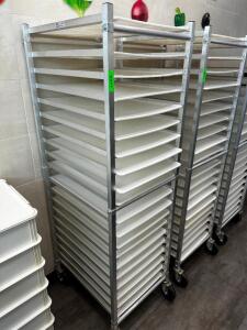 DESCRIPTION WINHOLT TWENTY PAN TRAY RACK W/ PLASTIC DOUGH SHEET. BRAND / MODEL: WINHOLT AL-1820BKD/HD/PO LOCATION FRONT QTY 1