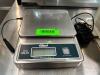 DESCRIPTION EDLUND DS-10 10 LB. DIGITAL PORTION SCALE. BRAND / MODEL: EDLUND DS-10 LOCATION FRONT QTY 1