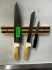 DESCRIPTION (3) KITCHEN KNIVES, MAGNETIC RACK, AND (1) SHARPENER. LOCATION KITCHEN QTY 1