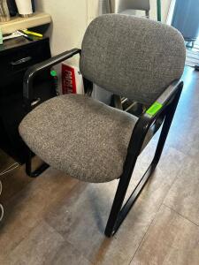 DESCRIPTION GREY UPHOLSTERED OFFICE CHAIR. LOCATION KITCHEN QTY 1