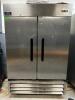 ARCTIC AIR AF49 TWO DOOR REACH IN FREEZER W/ TRAY RACK INSERTS.