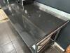 8' X 34" STAINLESS TABLE W/ BLACK STONE SLAB TOP. - 4