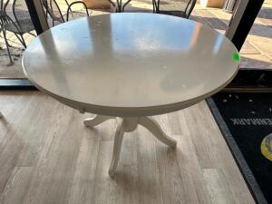 42" ROUND WHITE COMPOSITE TABLE W/ WOODEN BASE.