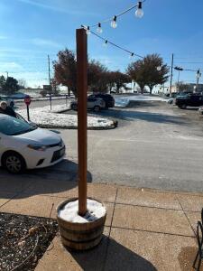 (3) WOODEN PATIO POSTS W/ STRAND LIGHTS