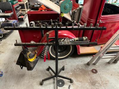 PNEUMATIC TOOL STAND ORGANIZER W/ FITTINGS AND GRINDER.