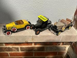 (3)ASSORTED COLLECTIBLE DYE CAST AND PLASTIC CARS.