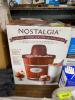 DESCRIPTION: 4-QUART WOOD BUCKET ICE CREAM MAKER BRAND/MODEL: NOSTALGIA RETAIL$: $38.00 LOCATION: WAREHOUSE QTY: 1 - 2