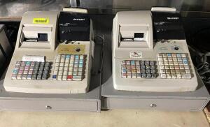 DESCRIPTION: (2) SHARP ELECTRONIC CASH REGISTERS, NO KEY. ADDITIONAL INFORMATION ONE LISTED AS NOT WORKING. LOCATION: BAY 7 THIS LOT IS: ONE MONEY QTY