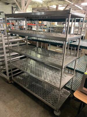 DESCRIPTION: 60" X 24" FIVE TIER STAINLESS SHELF -ON CASTERS. ADDITIONAL INFORMATION HEAVY DUTY SIZE: 60" X 24 "X 72" LOCATION: BAY 7 QTY: 1