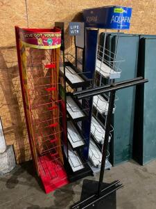 DESCRIPTION: (4) ASSORTED ROLL ABOUT WIRE FLOOR DISPLAY RACKS TOWERS. LOCATION: BAY 7 THIS LOT IS: ONE MONEY QTY: 1