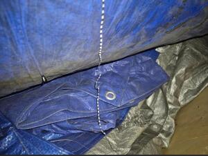 BOX OF PLASTIC TARPS