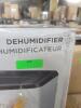 DESCRIPTION: (1) DEHUMIDIFIER WITH EFORTLESS CONTROLL BRAND/MODEL: FRIGIDAIRE INFORMATION: WHITE RETAIL$: $200.00 SIZE: 35 PINT QTY: 1 - 2