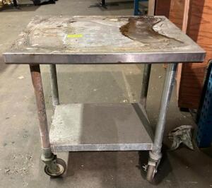 STAINLESS STEEL TABLE ON WHEELS