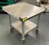 24" X 24" X 25" LOW BOY STAINLESS EQUIPMENT STAND W/ 1" BACK SPLASH.