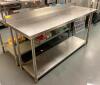 72" X 24" STAINLESS TABLE W/ 4" BACK SPLASH.