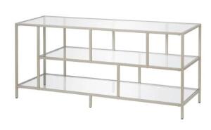 DESCRIPTION: (1) WINTHROP TV STAND BRAND/MODEL: MEYER & CROSS/TV0632 INFORMATION: SATIN NICKEL/GLASS SHELVES RETAIL$: 170.49 SIZE: 24"H X 16"D X 55"W