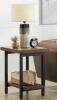 DESCRIPTION: (1) POMONA METAL & WOOD END TABLE BRAND/MODEL: BOLTON FURNITURE/AMBA0120 INFORMATION: RUSTIC NATURAL & BLACK/2-TIER RETAIL$: 204.87 SIZE: