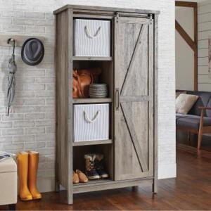 DESCRIPTION: MODERN FARMHOUSE STORAGE CABINET IN RUSTIC GRAY FINISH BRAND/MODEL: BETTER HOMES & GARDENS RETAIL$: $259.85 SIZE: 35.28"X18.03"X66.81" QT