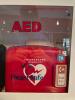 DESCRIPTION: DEFIBRILLATOR CABINET W/ HEARTSTART AED KIT BRAND/MODEL: PHILLIPS LOCATION: CORNER BAR QTY: 1 - 2