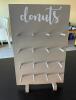 (2) ASSORTED WOODEN TABLE TOP DONUT WALL. HOLDS 16 DONUTS EACH - 2